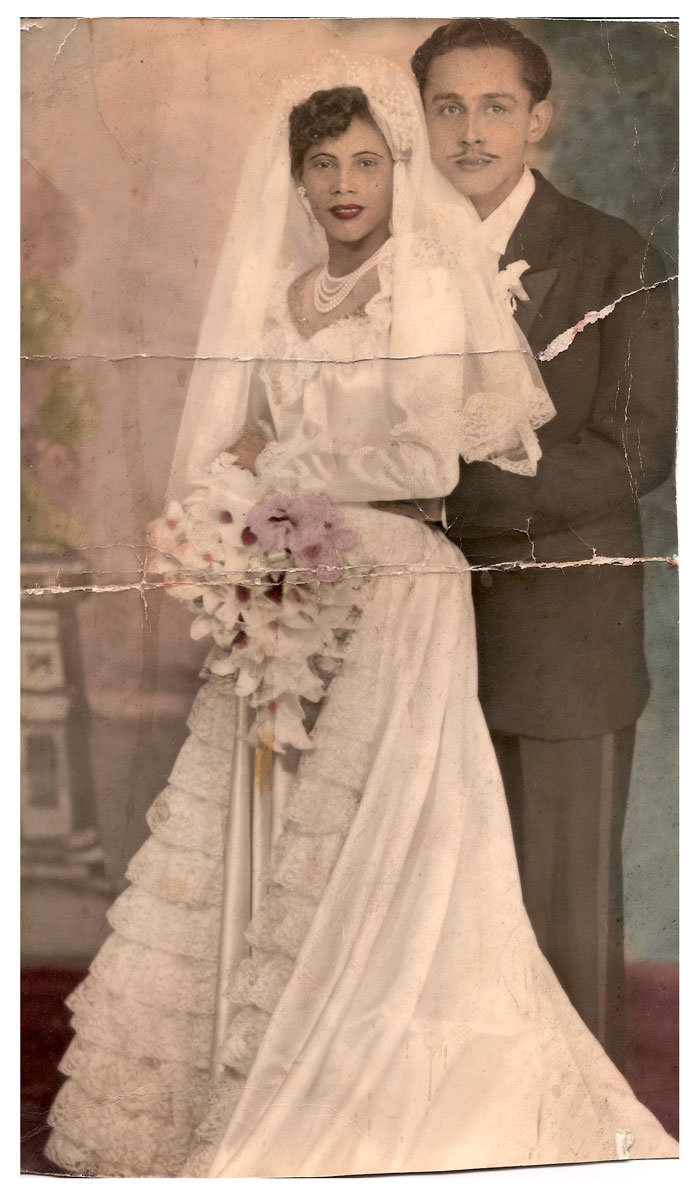 This is a rollover image showcasing the before and after image of a wedding I restored using photoshop.