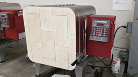 Image showing oven used to heat treat hammer head.
