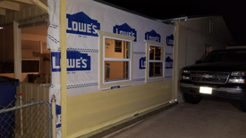 Image showing siding being applied to room renovation.